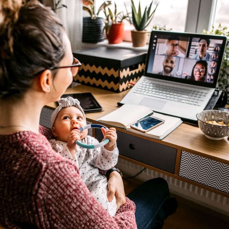 woman and baby at computer