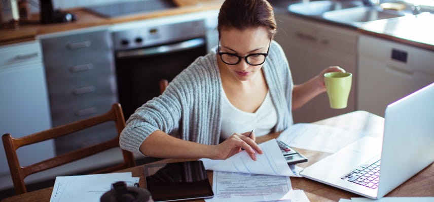 woman reading reports