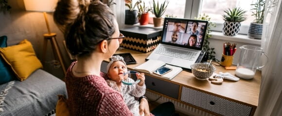 woman and baby at computer