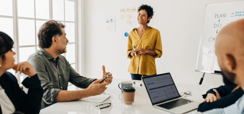 Group of professionals talking in a conference room