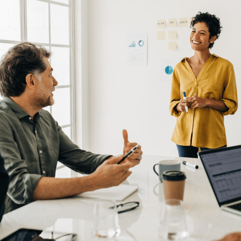 Group of professionals talking in a conference room