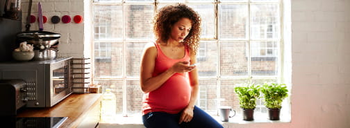 pregnant woman on phone