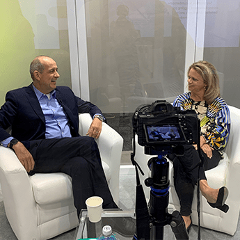 HR-Trends 2023 featured image of 2 people in a recording studio