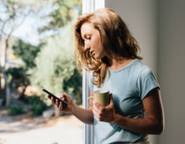 woman looking at phone