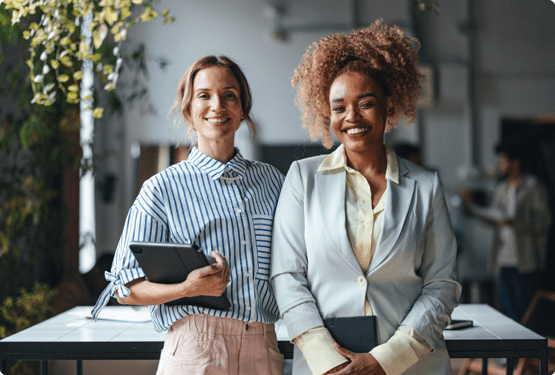 Two professionals posing at the camera