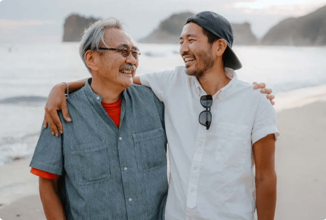 father and son laughing